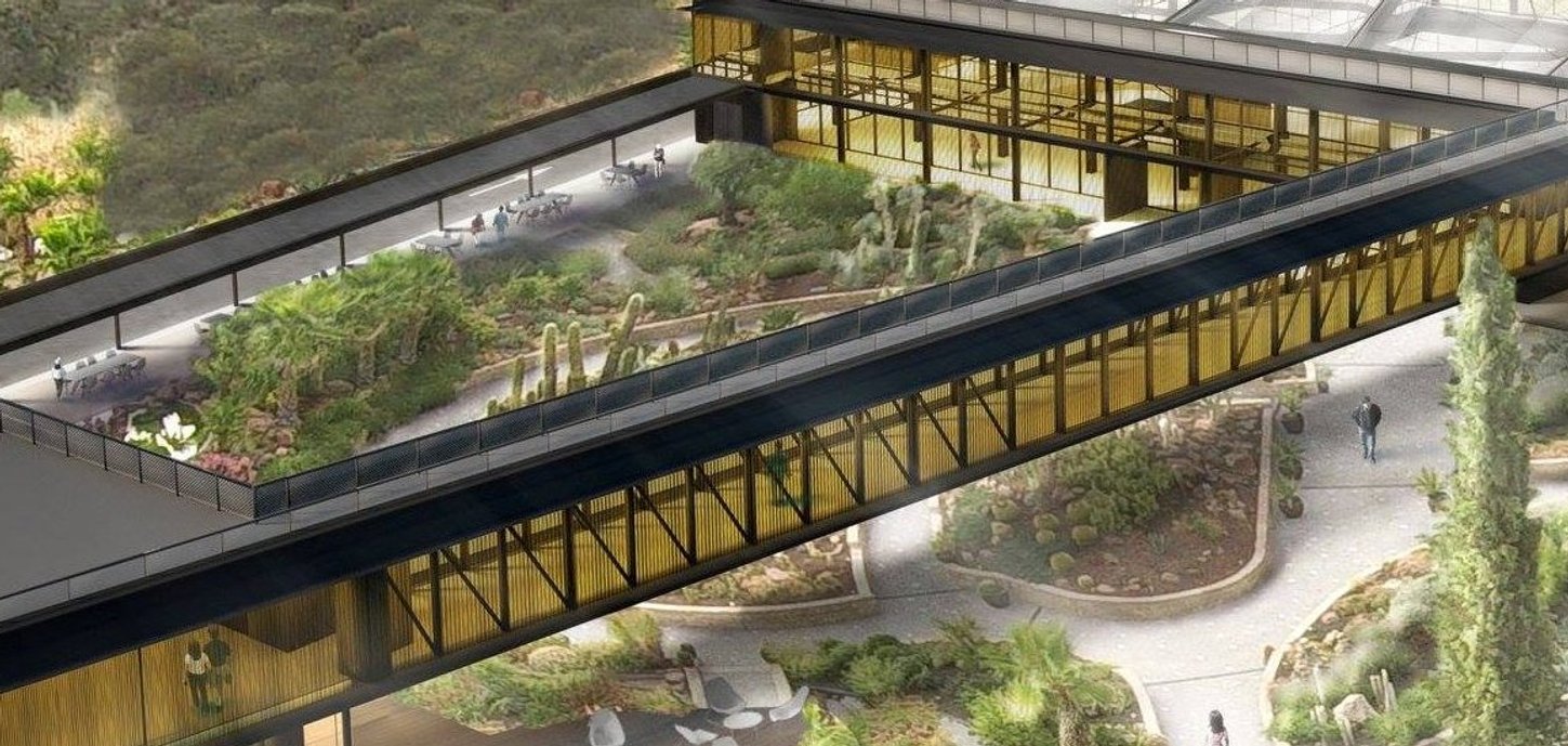 Desert City – perspectiva del edificio con fachada de vidrio curvado
